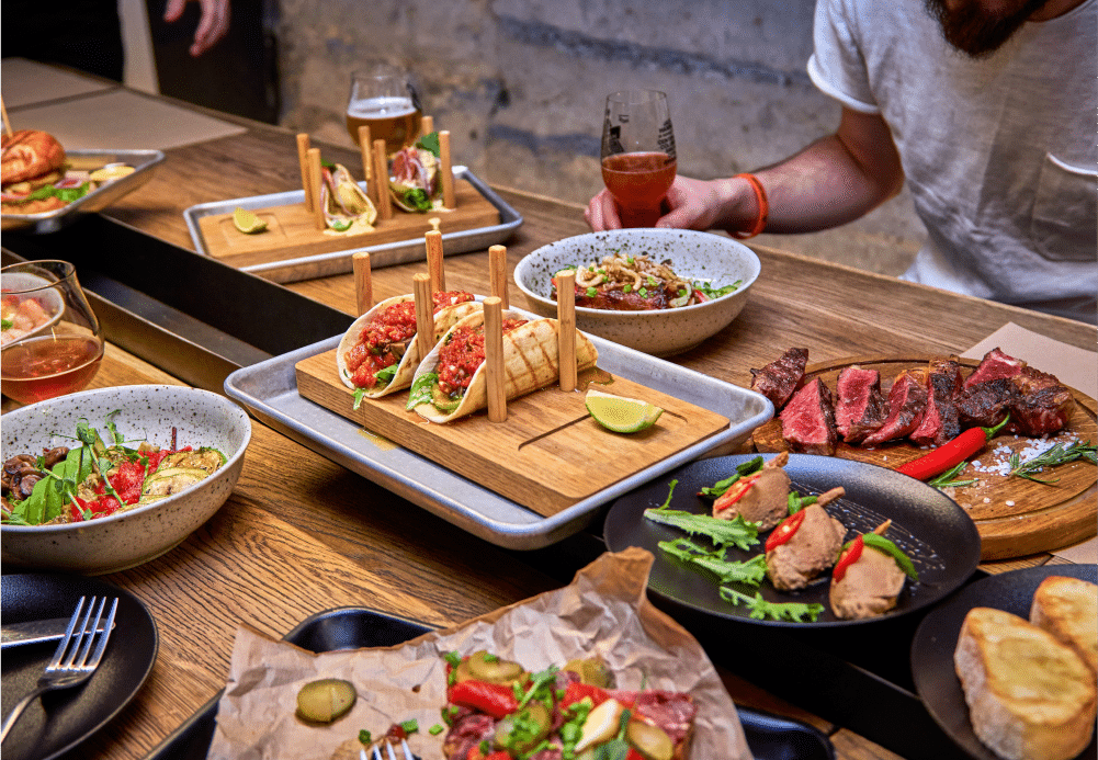A table with different dishes and drinks.
